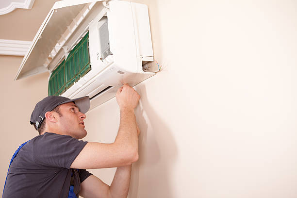 Strittmatter HVAC technician fixing AC indoor unit